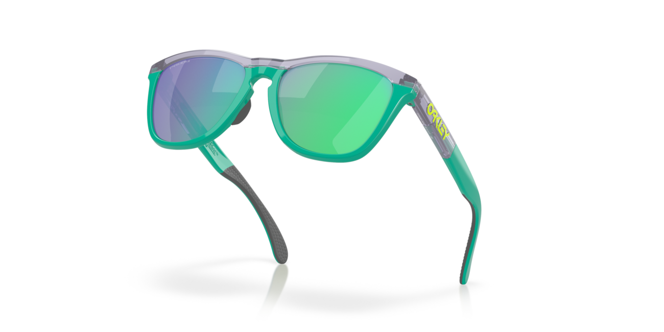Oakley FROGSKINS RANGE Sonnenbrille mit Rahmen Trans Lilac/Celeste und mit Dias Prizm Jade 55