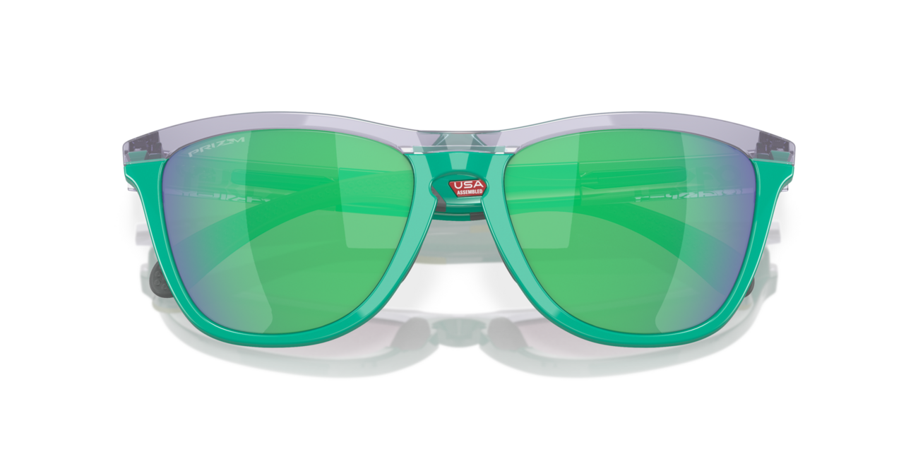 Oakley FROGSKINS RANGE Sonnenbrille mit Rahmen Trans Lilac/Celeste und mit Dias Prizm Jade 55