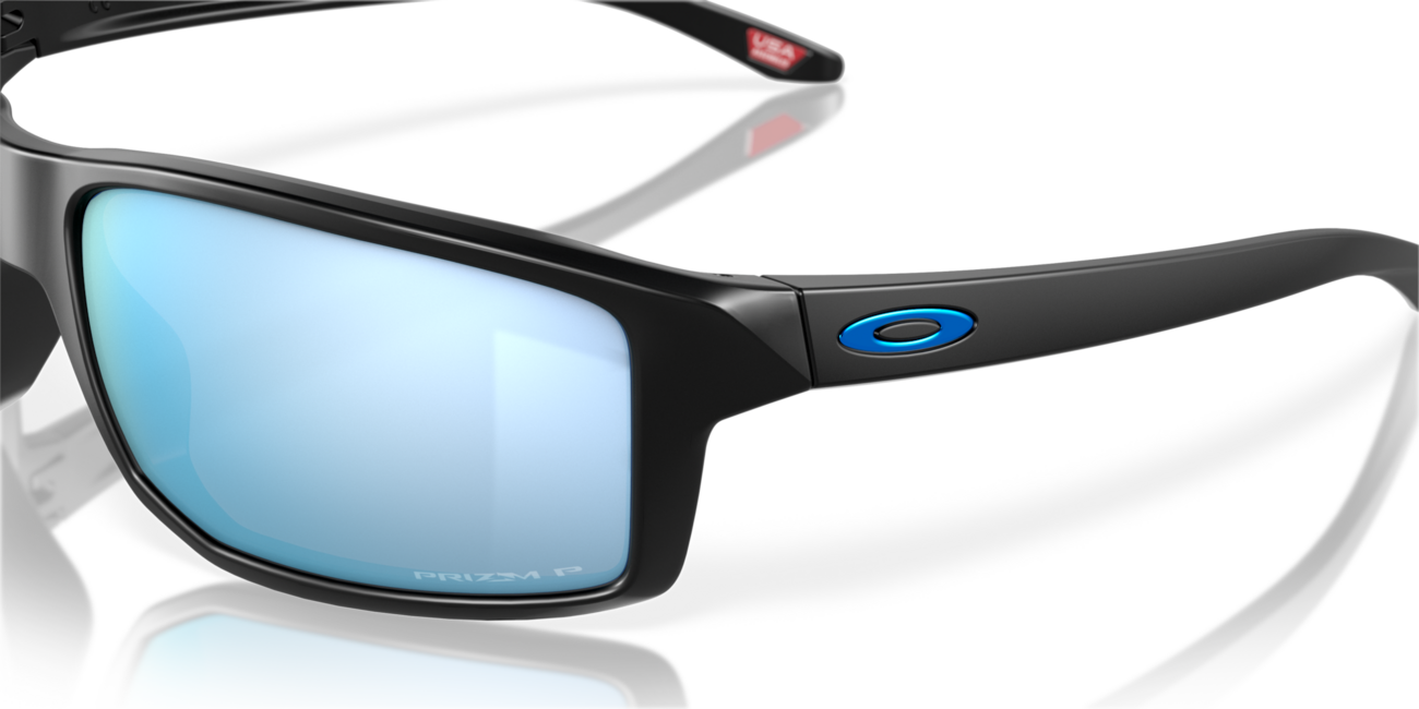 Oakley GIBSTON Sonnenbrille mit Rahmen Matte Black und mit Dias Prizm Deep Water Polar 61