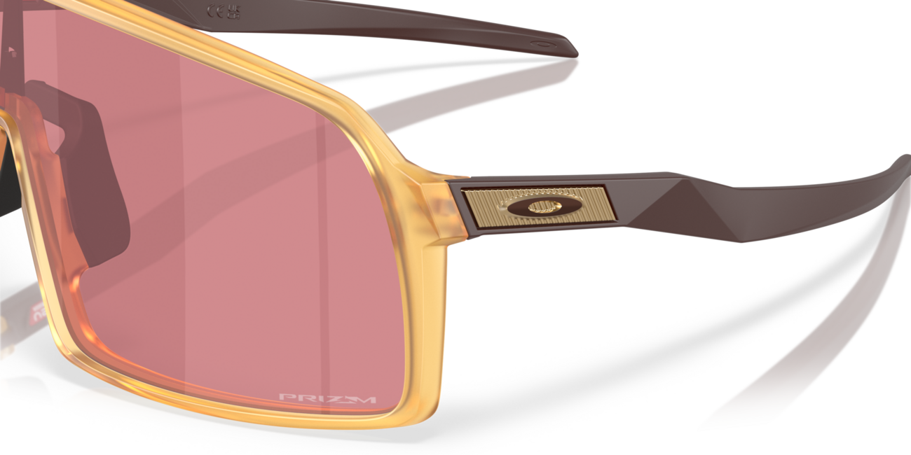 Oakley SUTRO Sonnenbrille mit Rahmen Matte Trans Light Curry und mit Dias Prizm Dark Golf , Steel