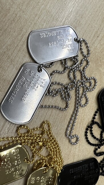 O&T Prägen von Dog Tags