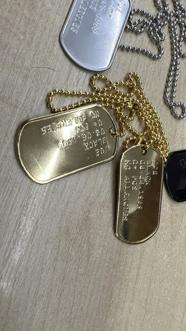 O&T Prägen von Dog Tags