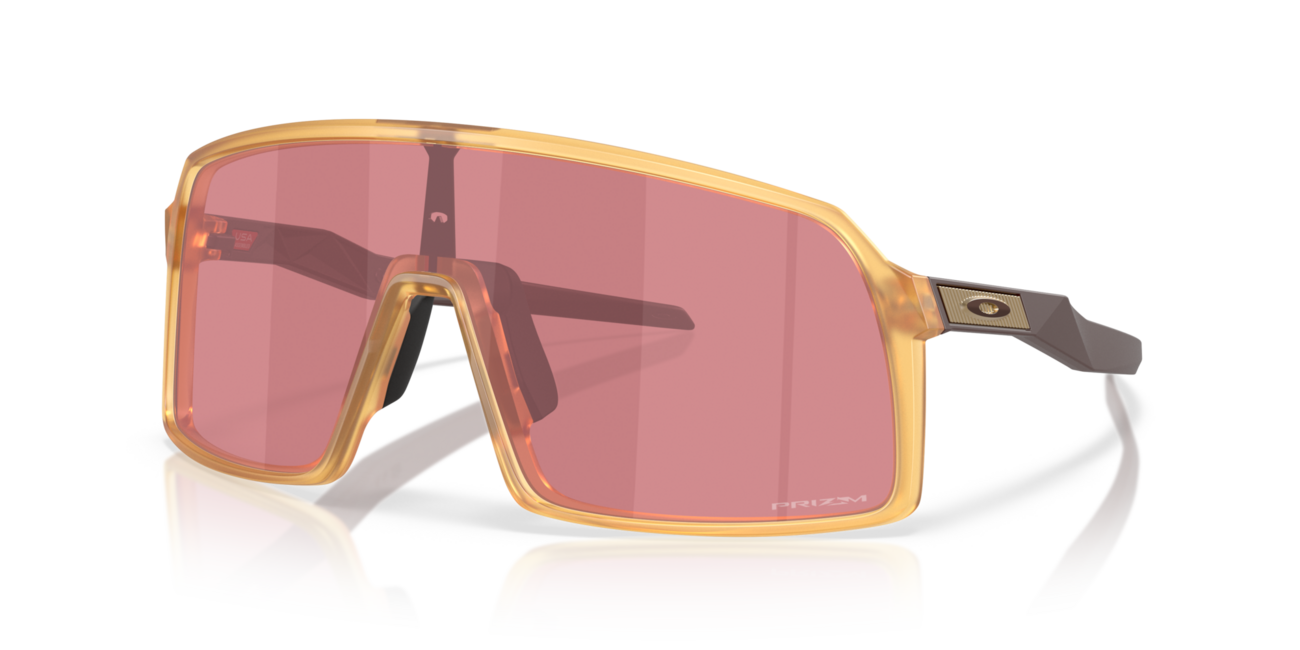 Oakley SUTRO Sonnenbrille mit Rahmen Matte Trans Light Curry und mit Dias Prizm Dark Golf , Steel